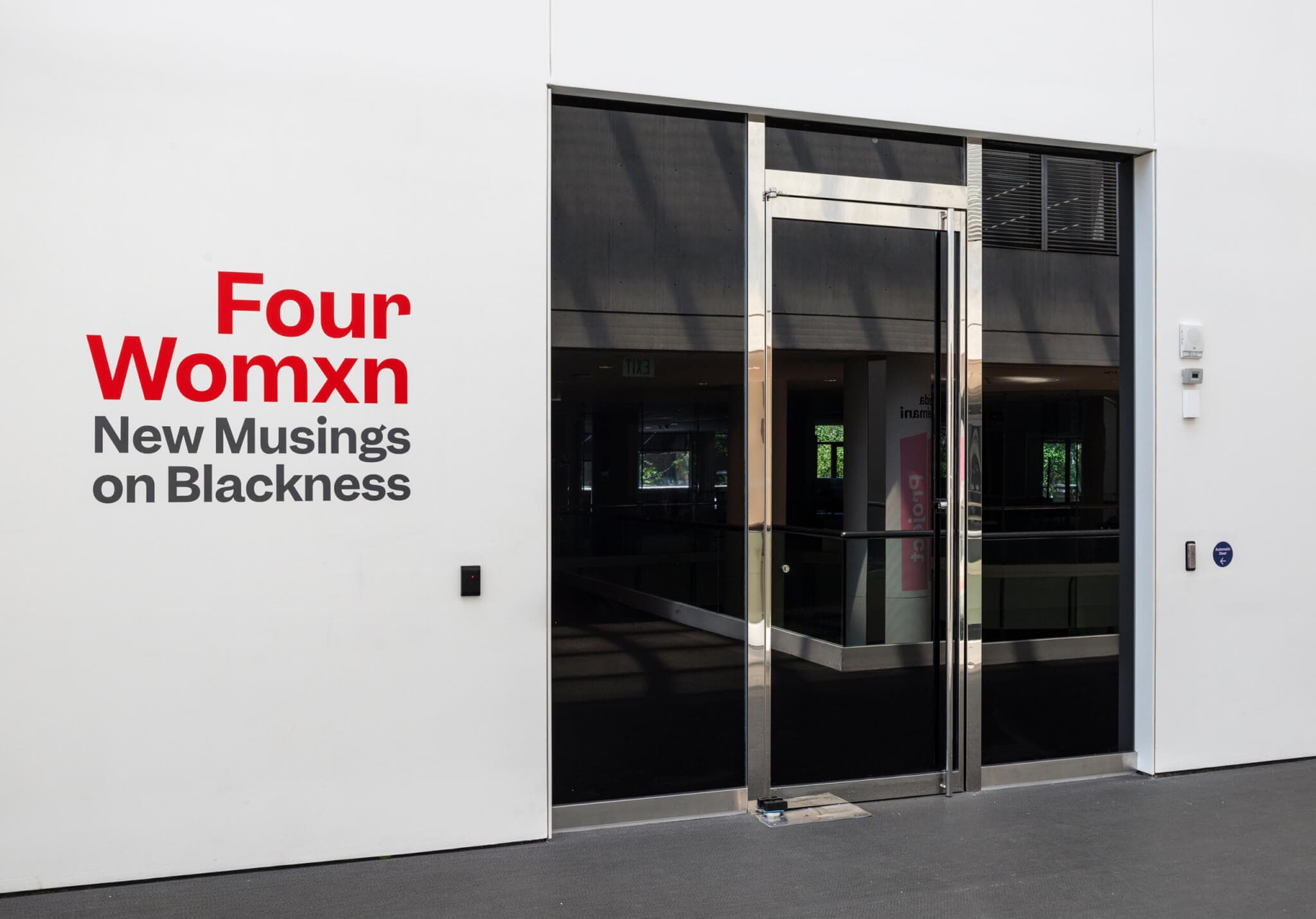 Entrance wall featuring "Four Womxn: New Musings on Blackness" exhibition text at the MFA, Boston.
